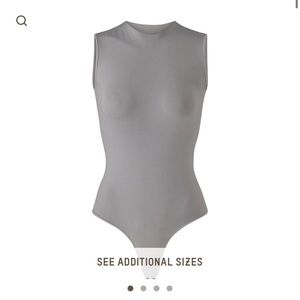 NWOT SKIMS ESSENTIAL CREW NECK SLEEVELESS BODYSUIT SIZE S/M
